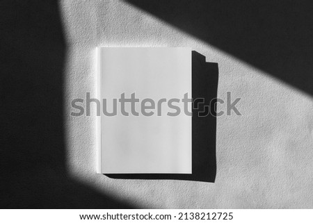 Mockup of brochure with fold. Blank mock up of booklet, menu and book. White paper of magazine. Mockup of leaflet. Template of twofold pamphlet isolated on white background with shadows.