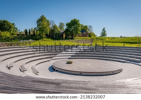 Panoramic view of the round open stage for a performance in the park.Vallimagi Open Air Centre,  Rakvere. Estonia. Royalty-Free Stock Photo #2138232007