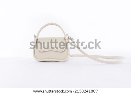 Womens leather handbag isolated on white background

