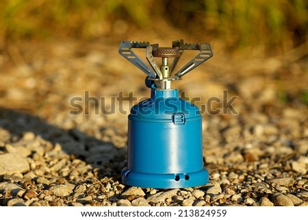 Gas camping stove in the nature background