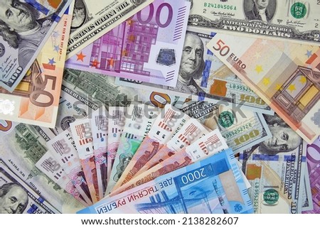 Money from different countries: dollars, euros, rubles. Top view. Royalty-Free Stock Photo #2138282607