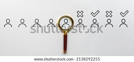 Selection of job candidates. Magnifying glass with abstract personas. Acceptance and rejection Royalty-Free Stock Photo #2138292255
