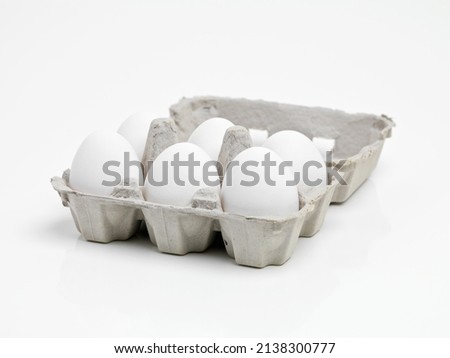 Ready to make an awesome breakfast. Studio shot of half a dozen white eggs in a carton. Royalty-Free Stock Photo #2138300777