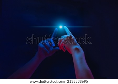 Woman hand touching a virtual screen futuristic technology digital. Royalty-Free Stock Photo #2138338695
