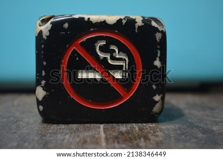  black cigarette ashtray with no smoking symbol