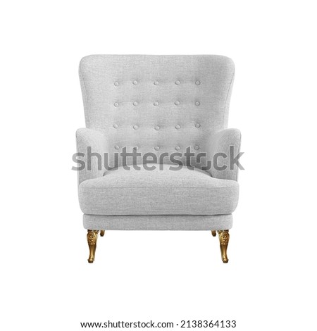 White quilted fabric classical art deco style armchair on decorative brass legs isolated on white background with clipping path. Front view, series of furniture Royalty-Free Stock Photo #2138364133