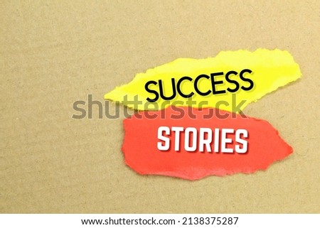 torn yellow and red paper with the words Success Stories