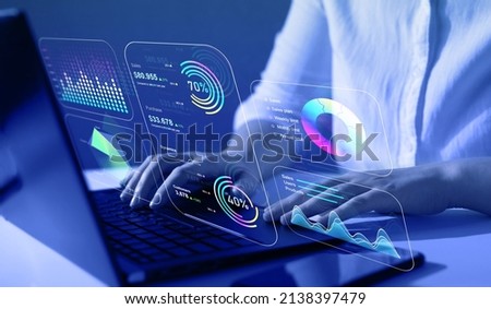 Advisor using KPI Dashboard on virtual screen.Business finance data analytics graph.Financial management technology. Royalty-Free Stock Photo #2138397479