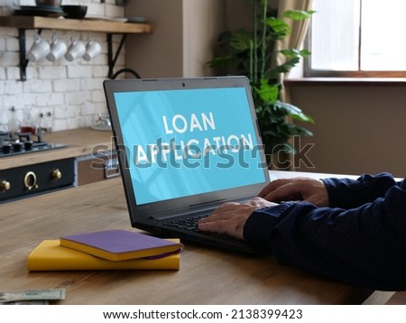 Loan Application is shown on a photo using the text