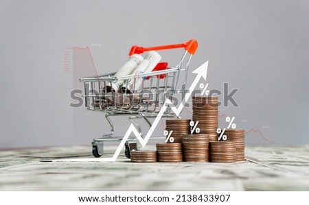 inflation Increased product sales growth basket growth, market or consumer price index concept shopping cart with food increase with arrow graph on the coin inflation VAT Royalty-Free Stock Photo #2138433907