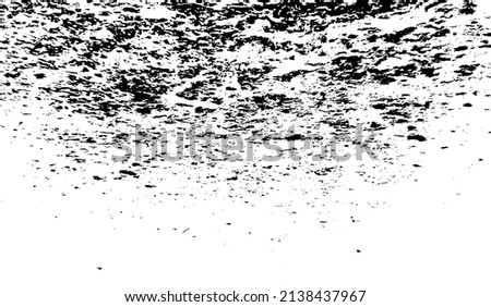 Small uneven spots and particles of debris. Abstract vector texture.  Distressed uneven background. Grunge texture overlay with fine grains isolated on white background. Vector illustration. EPS10.
