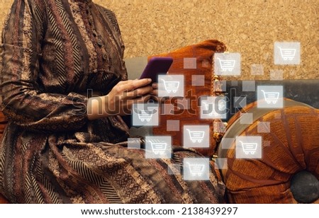 Business woman sitting in morocco lounge and using phone with online shopping concept