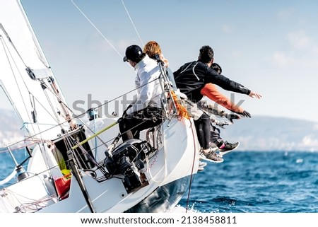 Sailing boat in light wind during regatta competition Royalty-Free Stock Photo #2138458811