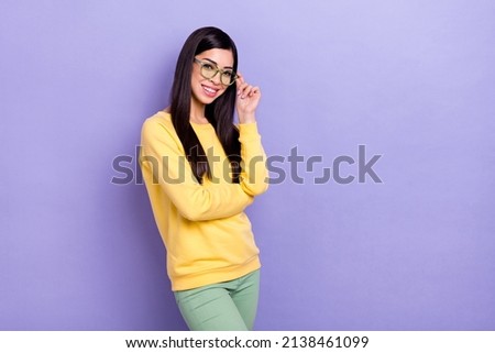 Photo of young lovely girl eyewear representative employee economist ophthalmology isolated over purple color background