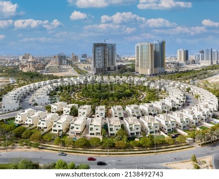 Aerial view of town house villa community in Jumeirah village circle Dubai Royalty-Free Stock Photo #2138492743
