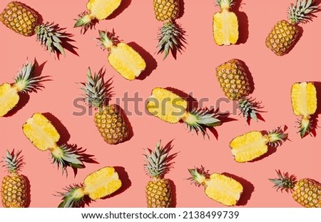Pattern of pineapple on coral background