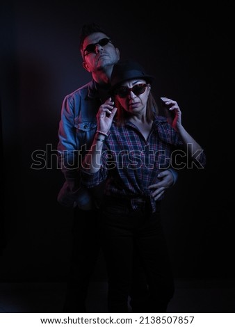 The poses of a beloved couple during a portrait shoot in the studio