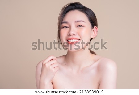 Attractive young Asian woman with fresh skin. Face care, facial treatment, , woman beauty skin isolated on white background. cosmetology, beauty skin and cosmetic concept Royalty-Free Stock Photo #2138539019