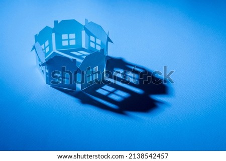 circle link of complete paper house in blue light with shadow in concept of business and tech.