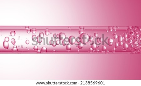 Macro shot of different sized clear bubbles flowing in glass tube with clear liquid on pale pink background | Abstract body care cosmetics mixing concept Royalty-Free Stock Photo #2138569601