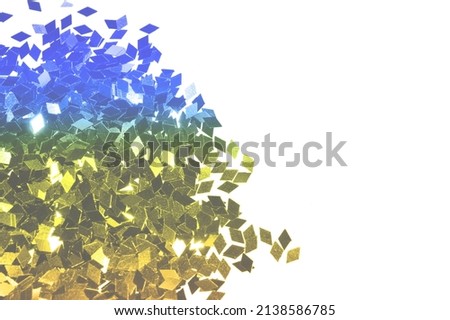 Textured background with yellow and blue glitter in colors of Ukrainian flag