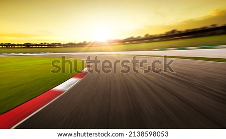 Sunset motion blurred race track. Royalty-Free Stock Photo #2138598053