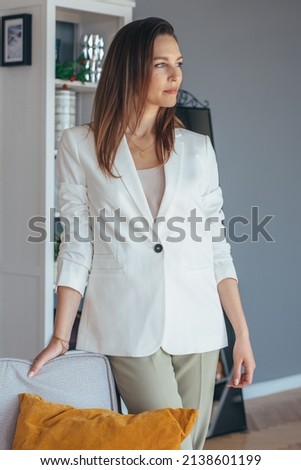 Portrait of a business woman in a white jacket Royalty-Free Stock Photo #2138601199