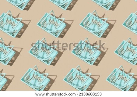 Empty shopping basket on a beige background. Minimalism. Sales, shopping, prices concept.