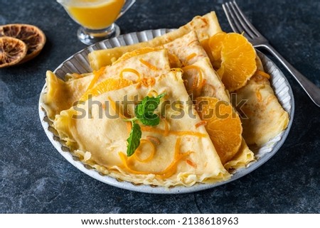 Crepes Suzette - French pancakes with orange liqueur sauce Royalty-Free Stock Photo #2138618963