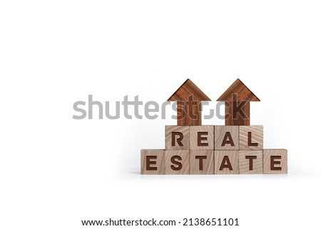 Real estate concept made of blocks with home sign isolated on white background