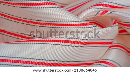White silk fabric, red and gray stripes, narrow stripe. line, stroke. Texture background. Template