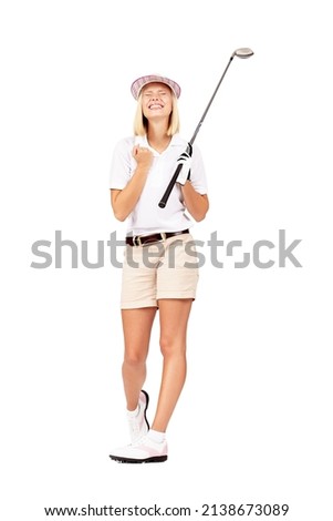 Yes I knew I could make that putt. Full length studio shot of an attractive female golfer celebrating a great shot isolated on white.