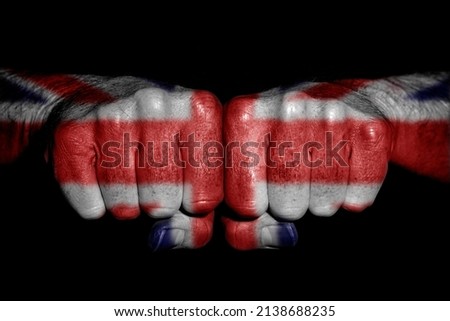 fists painted with the union jack flag.