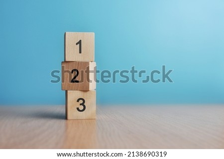 Cubes with numbers: 1,2,3. The order of priority in any activity is correct Royalty-Free Stock Photo #2138690319