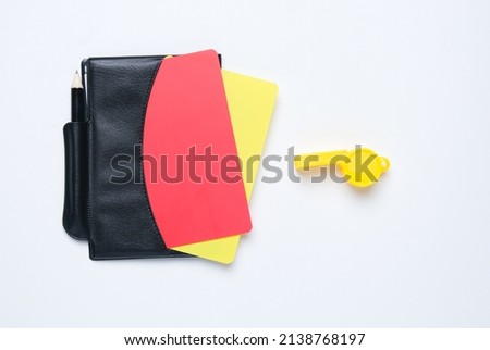 A picture of referee equipment set on white background. Follow the rules concept.