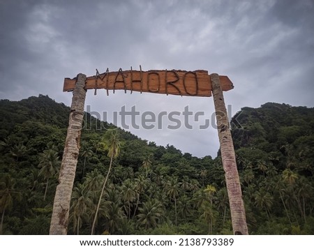 A gate that reads Mahoro. Mahoro is the name of a beach located in Sitaro Regency