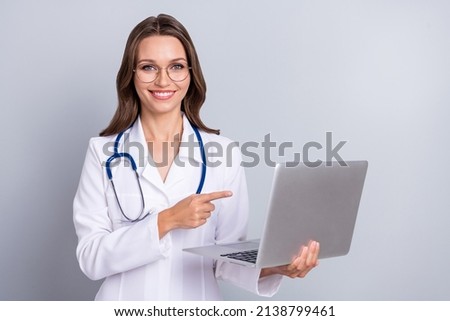 You can order drug here photo of lady pharmacist point netbook pills shopping quarantine isolated grey color background