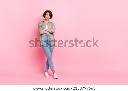Full size photo of smart lady marketer standing empty space crossing arms isolated pastel color background
