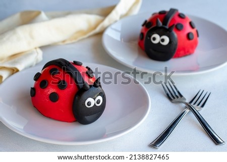 Ladybug design cake on a white background. close up