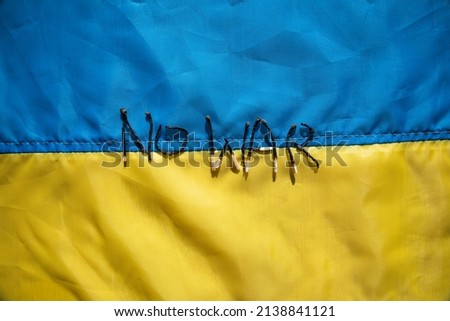 No war. Save Ukraine. Crisis, peace, stop aggression.Stop conflict between Ukraine and Russia.  blue and yellow background