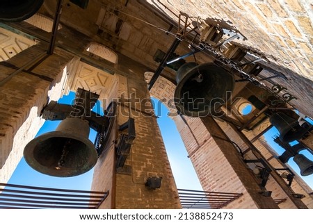 The bells of the Giralda Tower seen up close at the Great Cathedral of Seville, Spain. Royalty-Free Stock Photo #2138852473