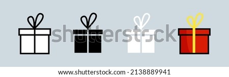 Gift box icon set. Wrapped gift box with ribbon icon in different style vector illustration.