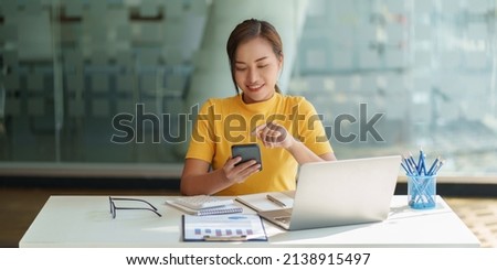 A businesswoman completes KYC using an online banking program in order to open a digital savings account. The definition of cyber security. Royalty-Free Stock Photo #2138915497