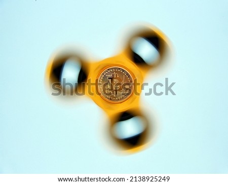 Bitcoin on rotating display on white background. New technological economy concept.