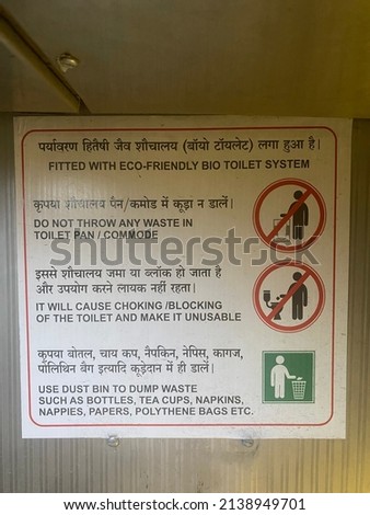 Different type of signage for throwing waste in toilet, choking toilet