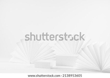 Fashion minimal modern asian style scene with two rectangle podiums mockup as showcase for displaying, presentation cosmetic product, goods with ribbed paper fans as decor, side view, corner, 3d.