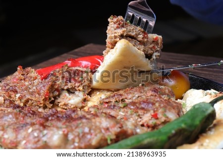Pizza with kebab, peppers and onions