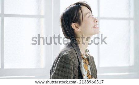 Attractive Asian female model with an attractive smile