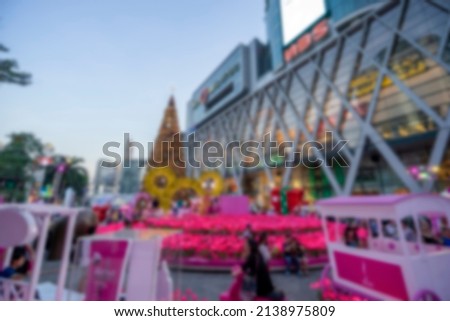 Blurred image of Festival city light with bokeh at twilight for background usage, City night light bokeh defocused background.