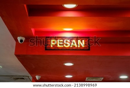 A sign of "pesan" means order here as translated in Malay language. Selective focus due low light